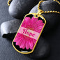 Hope Inspirational gold dog tag with the word Hope in pink along with a beautiful pink flower.