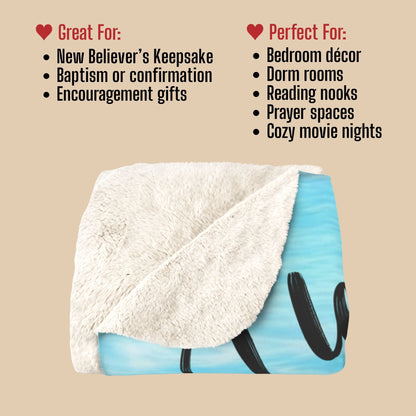 Folded blanket with text indicating uses on a beige background