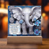 3D silver elephant and flowers on an acrylic plaque. Elephant is in front a beautiful blue background and also features Bible verse Joshua 1:9.