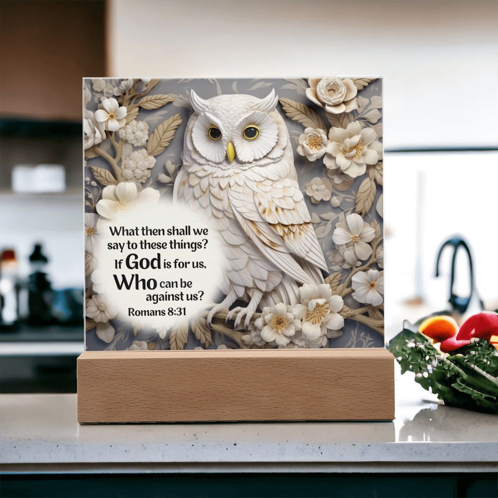 Acrylic Bible verse plaque features a captivating image of a beautiful white owl along with Bible Verse Romans 8:31. The owl as well as the flowers surrounding it appears to be in 3D.