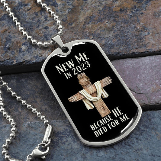 New Me In 2023 Because He Died For Me silver Dog Tag Necklace. Features a wooden cross with a crown of thorns on it with a black background.