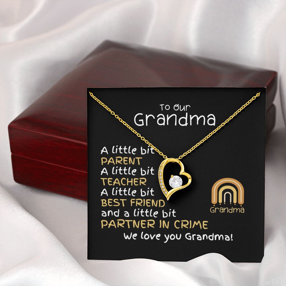 To our grandma from grandkids forever love cubic zirconia 18k gold filled heart necklace with message card and oreo gift box. Message card has children rainbow and cute message. With mahogany gift box.