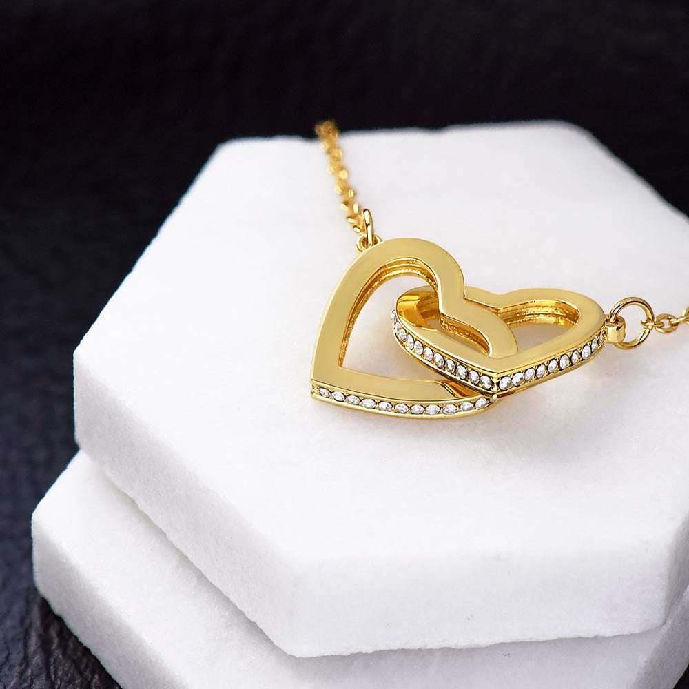 To daughter from mom - two 18K yellow gold filled Interlocking Heart Necklace on a white display.