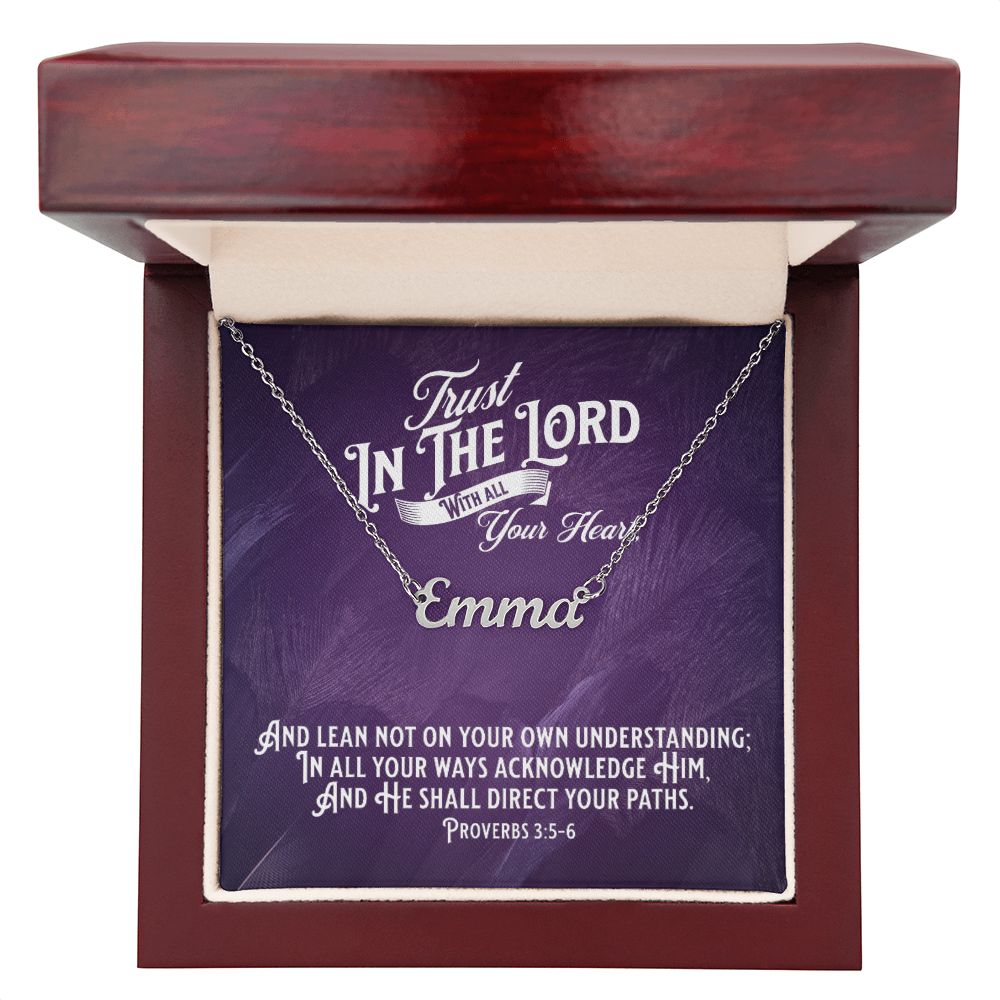 Custom Stainless Steel Name Necklace With Bible Verse Jewelry Message Card. Card features Bible verse Proverbs 3:5-6 - Trust In The Lord With All Your Heart. The card is in mahogany box has a deep purple background.